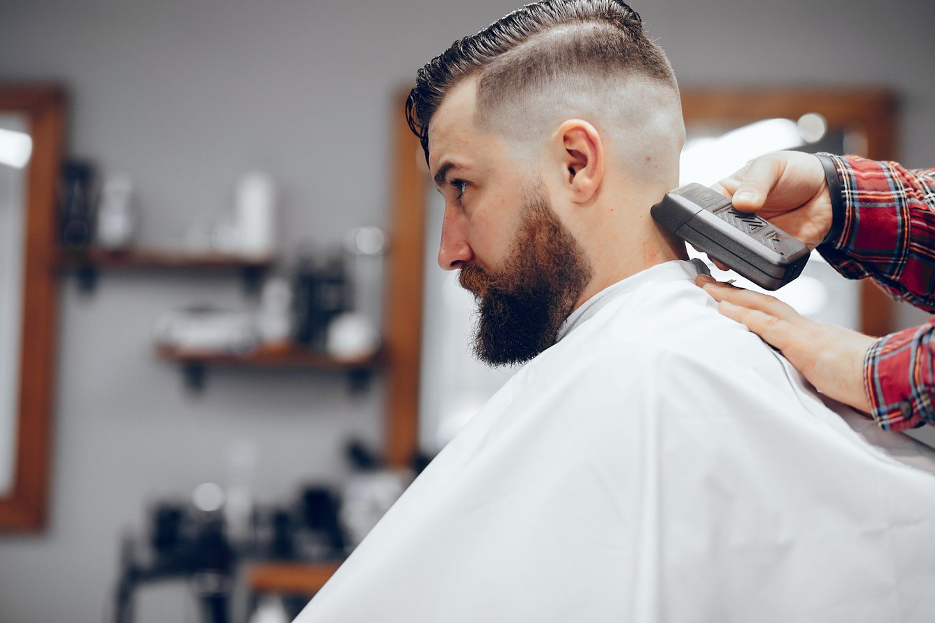 Stylish Man Sitting in a Barbershop