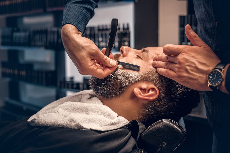 Barber Shaving Bearded Male